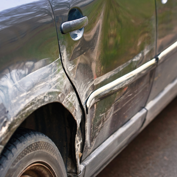 Vehicle with dents and scratches.